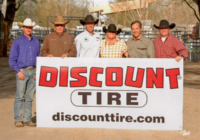 Blue Allen with Discount Tire folks and sign